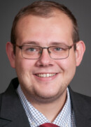Portrait of Zachary Hitchcock of the Department of Health Management and Policy at the University of Iowa College of Public Health.