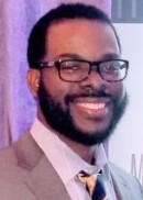 Portrait of Joel James of the Department of Health Management and Policy at the University of Iowa College of Public Health.