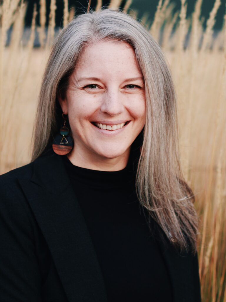 Portrait of Prof. Shannon Watkins of the Department of Community and Behavioral Health at the University of Iowa College of Public Health.