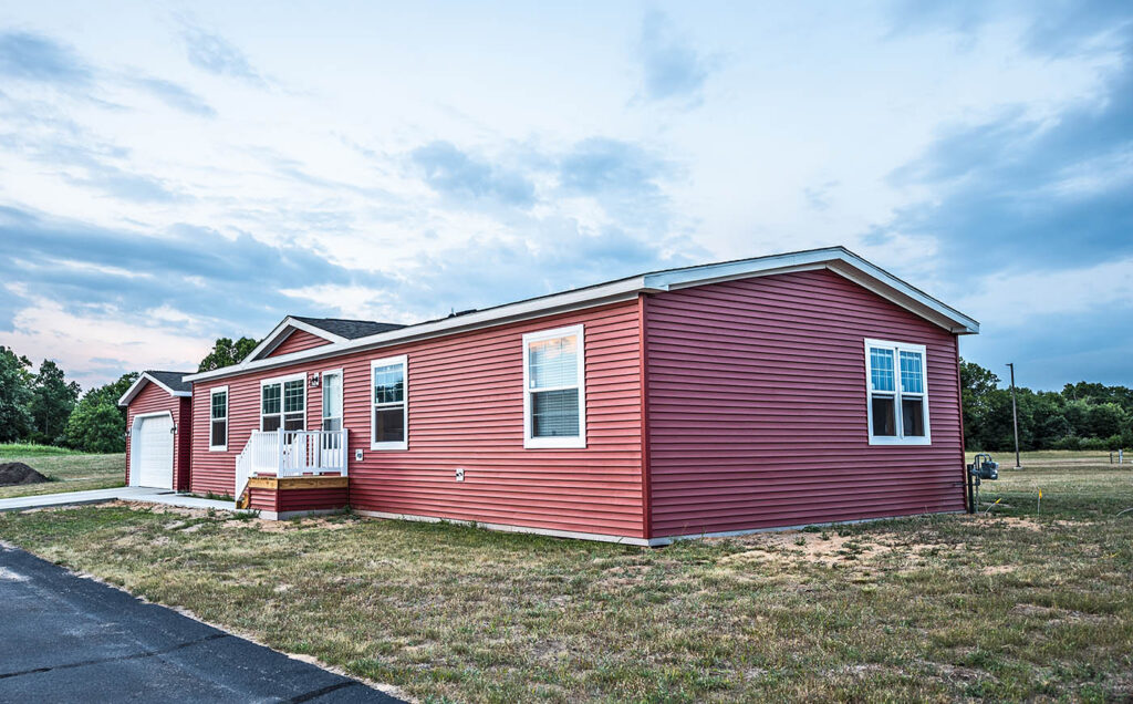 exterior of a new red manufactured home