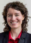 Portrait of Emily Lawton, assistant professor in the Department of Health Management and Policy at the University of Iowa College of Public Health.