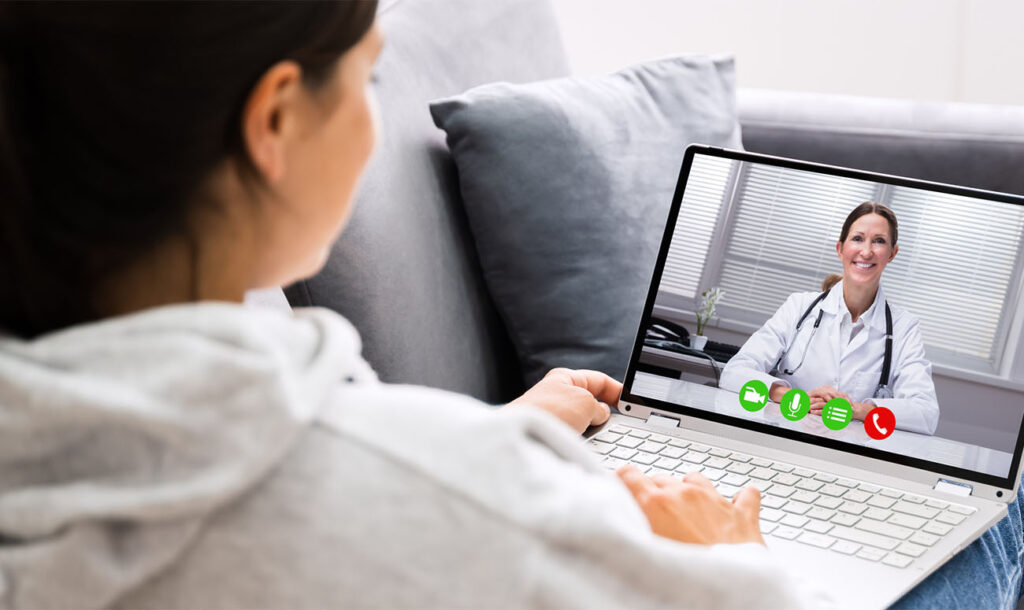 Telemedicine Video Call To Doctor On Laptop