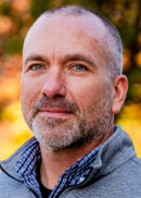 Portrait of Prof. Nathan Fethke, head of the Department of Occupational and Environmental Health at the University of Iowa College of Public Health.