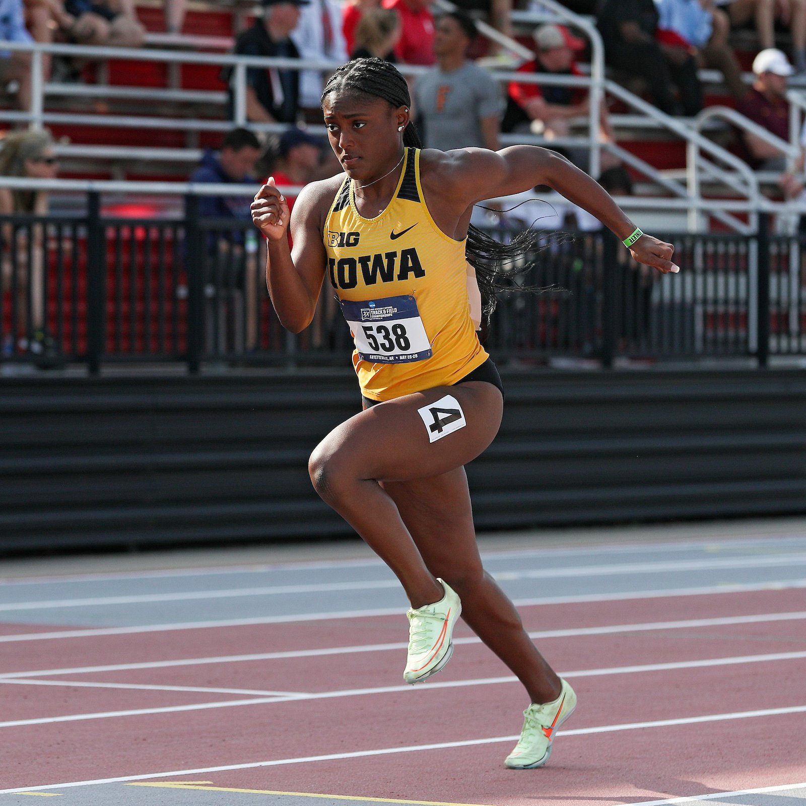 Lia Love running for the University of Iowa at a track event