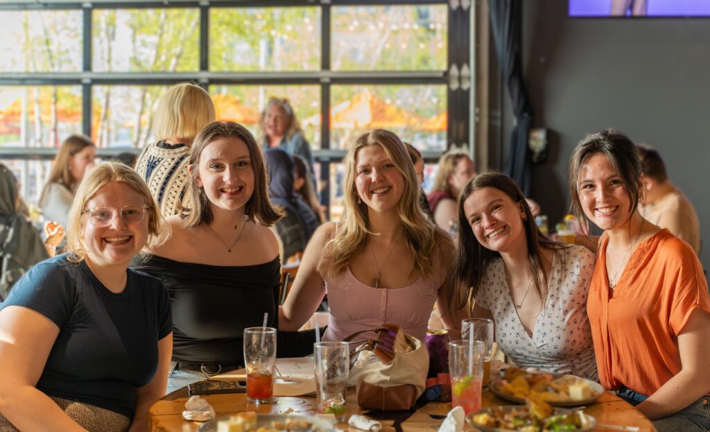 A group of College of Public Health students at a senior celebration.