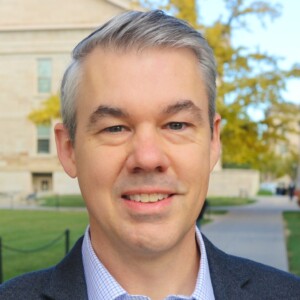 Portrait of Will Story, professor in the Department of Community and Behavioral Health at the University of Iowa College of Public Health.