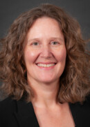 Portrait of Christine Feit, graduate program coordinator in the Department of Health Management and Policy at the University of Iowa College of Public Health.
