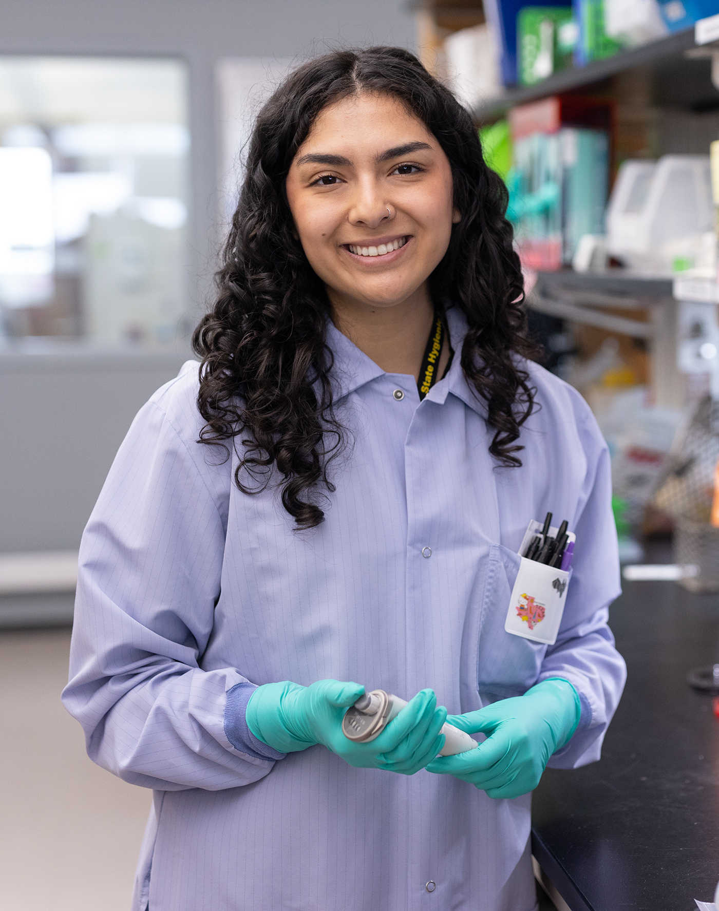 Epidemiology graduate student posing in laboratory