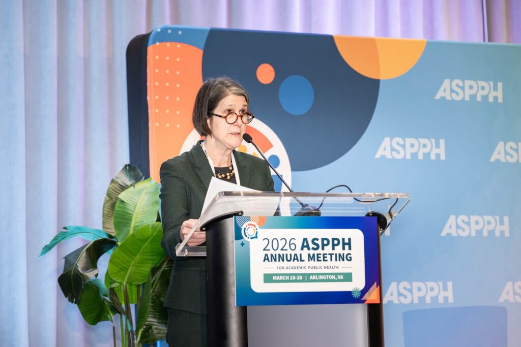 Edith Parker at the podium presenting at the 2026 ASPPH annual meeting