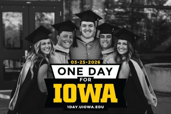 Students posing after graduation with a superimposed 'One Day for Iowa' logo
